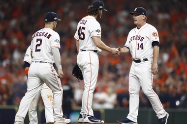 Houston Astros manager A.J. Hinch (R) removes pitcher Gerrit Cole (2R) from the game in the top of the eighth inning of their MLB American League Divsion Series playoff baseball game two at Minute Maid Park in Houston, Texas, USA, 05 October 2019. EFE/EPA/LARRY W. SMITH