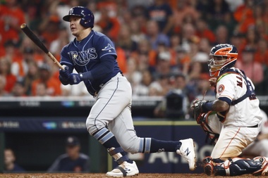 Tampa Bay Rays batter Avisail Garcia hits into a fielders choice which drives in a run against the Houston Astros in the top of the ninth inning of their MLB American League Divsion Series playoff baseball game two at Minute Maid Park in Houston, Texas, USA, 05 October 2019. EFE/EPA/LARRY W. SMITH