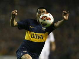 Riquelme brilhou no Boca, mas também jogou com astros no Barcelona. EFE/Javier Garcia Martino