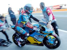El campeón del mundo de Moto2, el piloto español Álex Márquez, en el circuito Ricardo Tormo este sábado en la tercera sesión de entrenamientos del Gran Premio de la Comunitat Valenciana donde ha logrado la segunda clasificación directa. EFE/Kai Försterling