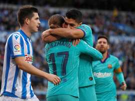 Suarez and Messi celebrate after scoring the second goal. EFE