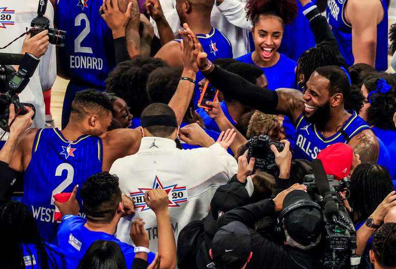Team LeBron forward LeBron James (R) high fives Team LeBron guard Russell Westbrook (L), after the NBA All Star game, between Team Lebron and Team Giannis, at the United Center in Chicago (Illinois, USA) EFE/Nuccio Dinuzzo