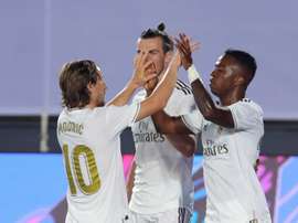 Vinicius e Modric estão entre os titulares do Real Madrid para enfrentar o Getafe. EFE/JuanJo Martín