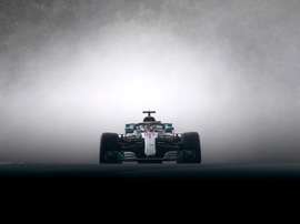 Mogyorod (Hungary).- British Formula One driver Lewis Hamilton of Mercedes AMG GP leaves a cloud of grey smoke as he speeds during the qualifying session of the Hungarian Formula One Grand Prix at the Hungaroring circuit in Mogyorod, Hungary, 28 July 2018 (reissued 21 May 2020). Considered to be a EFE/EPA/TAMAS KOVACS/Archivo