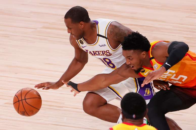 Los Angeles Lakers guard Dion Waiters (L) and Utah Jazz guard Donovan Mitchell battle for the ball in the third quarter of the NBA basketball game between the Los Angeles Lakers and the Utah Jazz at the ESPN Wide World of Sports Complex in Kissimmee, Florida, USA, 03 August. EFE/EPA/ERIK S. LESSER