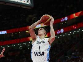 JJPANA3123. BOGOTÁ (COLOMBIA), 04/08/2020.- Fotografía de archivo del argentino Agustin Caffaro saltando para encestar en un partido de la Copa Mundial de Baloncesto FIBA 2019 entre Argentina y España el 15 de Septiembre de 2019 en Pekín (China). De jugar la final del Mundial de China a la segunda división uruguaya. Así cambió la realidad deportiva del baloncestista Agustín Caffaro que, tras la suspensión de la liga argentina por la COVID-19, cruzó el Río de la Plata en busca de minutos y de su primera experiencia fuera de casa. EFE/HOW HWEE YOUNG