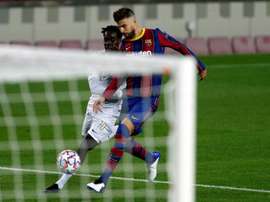 Pique (R) is one of Barca's best central defenders ever. EFE