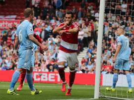 Negredo celebrating a goal. AFP