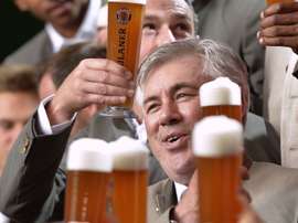 Ancelotti and his players at a public event.FCBayern