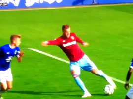 Yarmolenko curled beyond a helpless Pickford. Screenshot