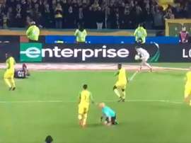 Carlos kicked by ref and sent off. Twitter