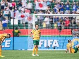 Australian players react to their 1-0 loss to Japan after their quarter-final football match in Edmonton, Alberta on June 27, 2015
