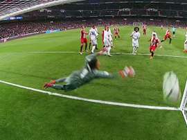 Stuani heads past Navas. Screenshot