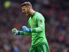 De Gea celebrating a victory. AFP