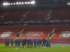 Ajax stars train on Anfield pitch. DUGOUT