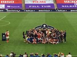 Arsenal's players were delighted after beating Chelsea in the FA Cup final. DUGOUT