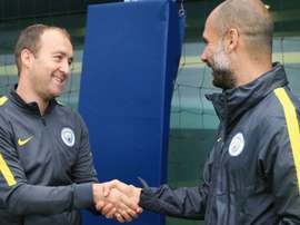 Nick Cushing, coach of Manchester City Women, with Pep Guardiola. ManCityWomen