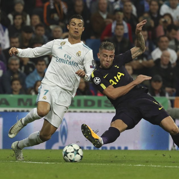 Toby Alderweireld of Tottenham challenges Cristiano Ronaldo, then of Real Madrid. AFP