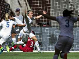 England Lucy Bronze (C) celebrates her goal against Canada with teammate Steph Houghton and Claire Rafferty (R) during the match at the 2015 FIFA Women World Cup in Vancouver on June 27, 2015