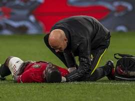 Eric Bailly se blesse au genou. AFP