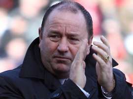 Cheltenham have parted ways with Johnson. AFP