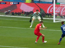 Haraguchi unleashes his shot towards the far post, beating Courtois