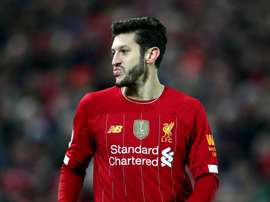 Liverpool cannot take foot off the gas, says Lallana. Goal