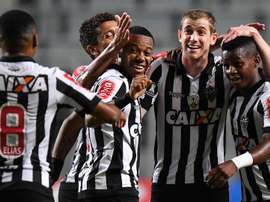 Adilson Cazares Elias Marcos Rocha Robinho Atletico-MG Godoy Cruz. AFP
