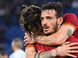 Florenzi abbracciato dai compagni. Goal