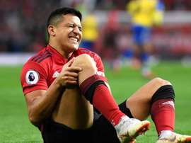 Alexis Sanchez hobbled off against Southampton. GOAL