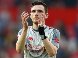 Liverpool's Robertson has treatment on infected hand. GOAL