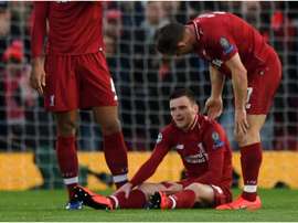 Andrew Robertson went down injured in the first half