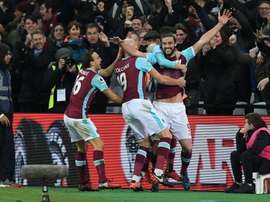 Andy Carroll celebrates scoring his stunning volley. Goal