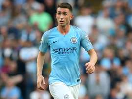 Man City's Laporte taken off on a stretcher against Brighton. GOAL