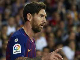 Messi broke his arm after falling awkwardly against Sevilla. GOAL