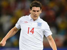 Former England international Barry retires at 39