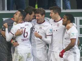 Bayern Munich players celebrating their win. Goal