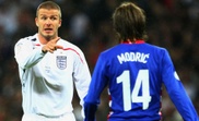 Beckham e Modric enfrentaram-se nas qualificações de 2008. Goal