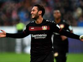 Hakan Calhanoglu celebrating a goal with Leverkusen. Goal