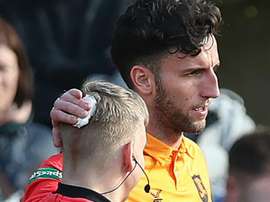 Spence received treatment on the touchline for a minor head wound. GOAL