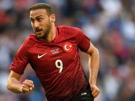 Turkey striker Tosun sorry for red card after supporter confrontation