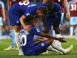 Callum Hudson-Odoi went down in agony for Chelsea. GOAL