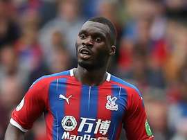 Benteke, Tomkins renew Palace deals. GOAL