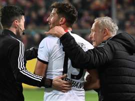 Abraham charges over Freiburg coach