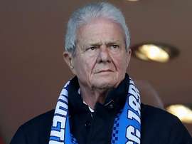 Dietmar Hopp tells 'idiot' fans: I won't stop coming to Hoffenheim games. AFP