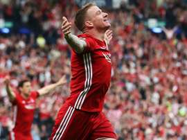 Celtic have raided Aberdeen for winger Jonny Hayes. GOAL