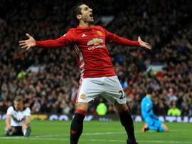 Mkhitaryan celebrates his goal against Tottenham Hotspur. Goal