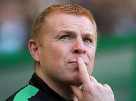 Hibernian manager Neil Lennon was hit by a coin during the match. GOAL