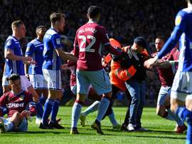 Grealish was punched by a pitch invader. GOAL