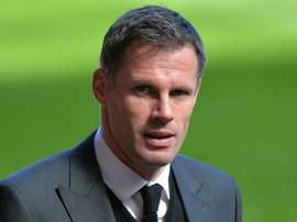 Carragher apologises to Evra